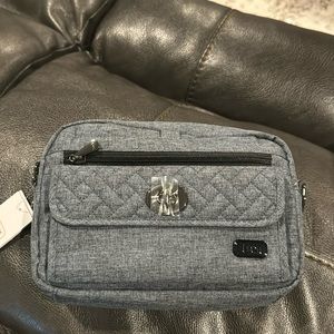 Lug crossbody switch purse brand new.